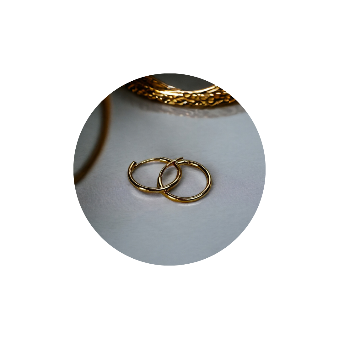 https://genuinestorellc.com/categoria-producto/hoops-earrings/